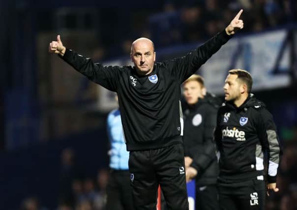 Pompey boss Paul Cook took off Michael Doyle and Christian Burgess at half-time Picture: Joe Pepler
