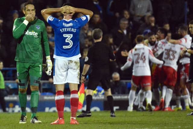 David Forde and Enda Stevens cut dejected figures as Stevenage celebrate victory over the Blues Picture: Barry Zee