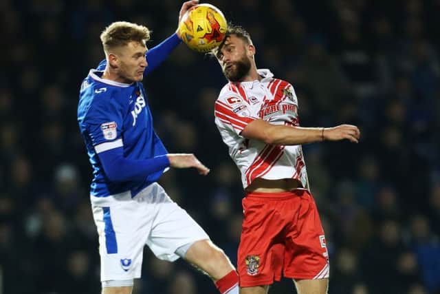 Michael Smith, left, was gaffer for a day Lee Laver's Pompey man of the match Picture: Joe Pepler