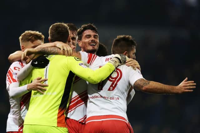 Stevenage's players celebrate victory over Pompey   Picture: Joe Pepler