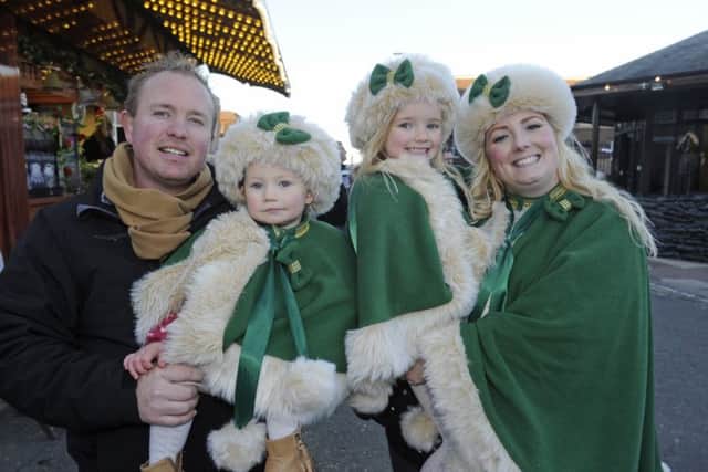 From left, Ben Vallis from Hayling Island with daughters Molly, one, Betsy, four, and his partner Shelley Meredith Picture: Ian Hargreaves (161341-6)