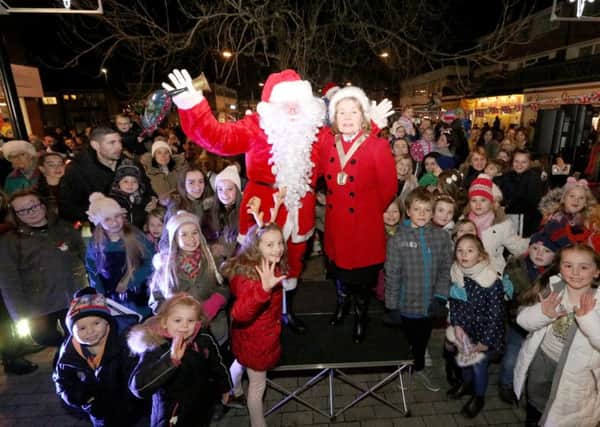 Santa and Deputy Mayor Elaine Shimbart start the countdown for the lights to be switched on Picture: Habibur Rahman