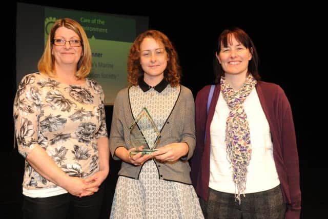 Linzi Stean from Colas presents the Care of the Environment Award to Southsea's Marine Conservation Society 

Picture: Sarah Standing (161597-3826)