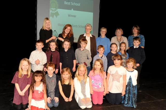 Back left, Justine Jones from PHVC Minibus presents the Best School Award to winners Mengham Infants School
Picture: Sarah Standing (161597-3845)