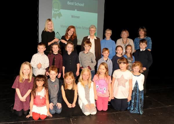 Back left, Justine Jones from PHVC Minibus presents the Best School Award to winners Mengham Infants School
Picture: Sarah Standing (161597-3845)