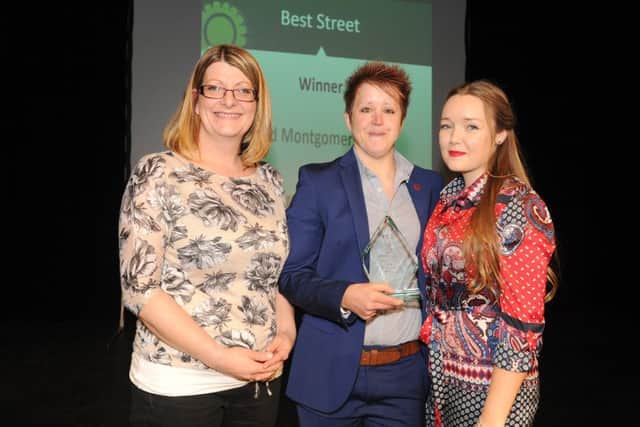 Linzi Stean from Colas, left, presents the Best Street Award to winners Lord Montgomery Way in Portsmouth 

Picture: Sarah Standing (161597-3863)