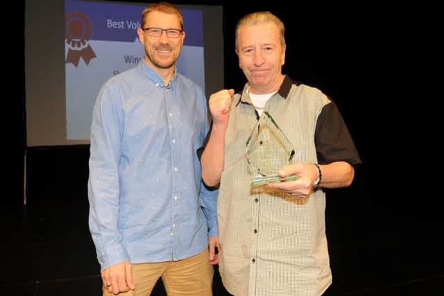 Editor of The News, Portsmouth Mark Waldron presents the Best Volunteer Award to Shaun Coughlan

Picture: Sarah Standing (161597-3795)