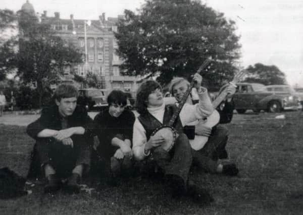 Rod 'Banjo' Stewart relaxing with friends on Southsea Common in front of the Queen's Hotel