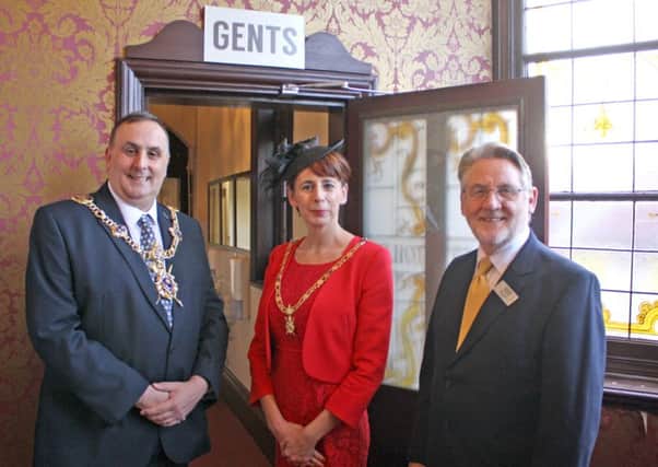 Lord Mayor of Portsmouth Councillor David Fuller, Lady Mayoress Leza Tremorin and Kings Theatre Trust chairman Ron Hasker reopening the improved toilets