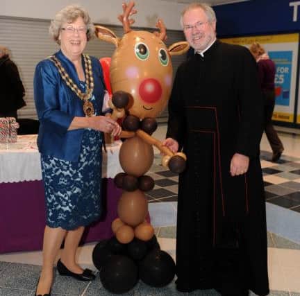 Rev Roger Jackson with Mayor of Fareham Connie Hockley at the Fareham Shopping Centre Christmas grotto