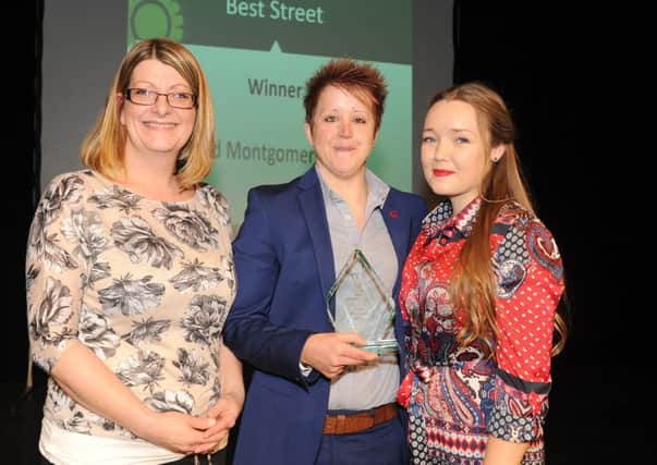 (L-r) Linzi Stean from Colas presents the Best Street Award to Carrie Shay and Kaitlin McKenzie