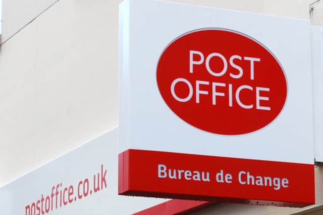 Post Office sign Picture: PA