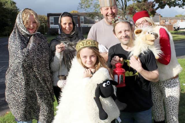 Alli Henry, Sandra Smith, the Rev Jonathan Jeffery and Louise Elkington with April Elkington and Francis Vassallo - members of the cast of St Clares Church nativity play