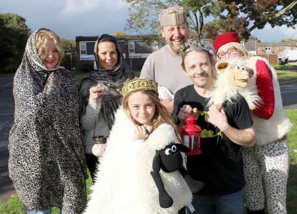 Alli Henry, Sandra Smith, the Rev Jonathan Jeffery and Louise Elkington with April Elkington and Francis Vassallo - members of the cast of St Clares Church nativity play