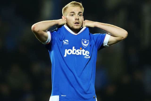 Substitute Jack Whatmough looks shocked as Pompey fall to defeat to Stevenage on a day of drama at Fratton Park