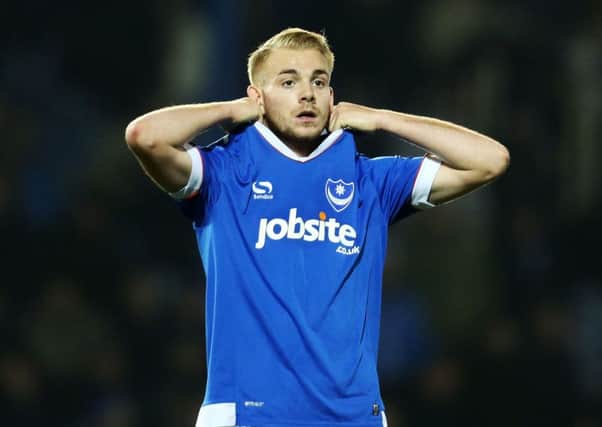 Substitute Jack Whatmough looks shocked as Pompey fall to defeat to Stevenage on a day of drama at Fratton Park