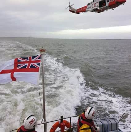 Royal Navy, the RNLI and the Coastguard were involved in the rescue operation