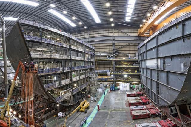 HMS Prince of Wales, the second of the Royal Navy's Queen Elizabeth Class aircraft carriers, at BAE Systems' shipbuilding bay in Portsmouth Naval Base