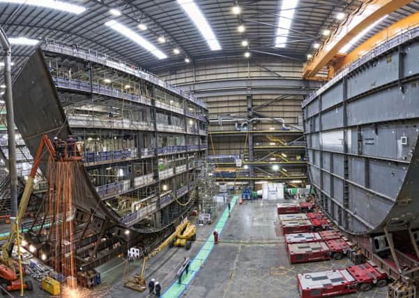 HMS Prince of Wales, the second of the Royal Navy's Queen Elizabeth Class aircraft carriers,  at BAE Systems' shipbuilding bay in Portsmouth Naval Base