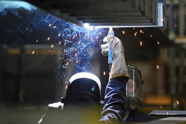 Welding taking place on the aircraft carrier HMS Queen Elizabeth. Picture: Sarah Standing