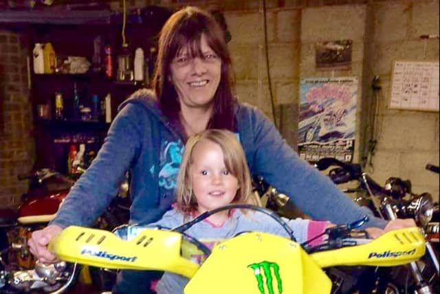 Julie Corben with her grandaughter Maisie in 2013