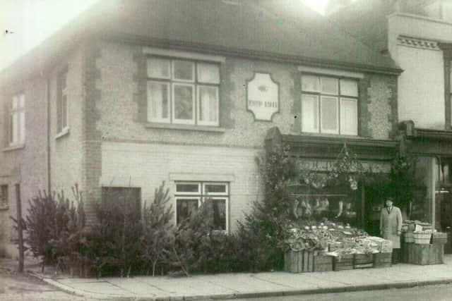 Christmas trees for sale outside Jestico's, 1953