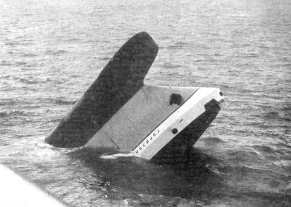 The bow of the Russian factory ship, Gorizont, protrudes from the sea 22 miles south of St Catherine's Point, Isle of Wight