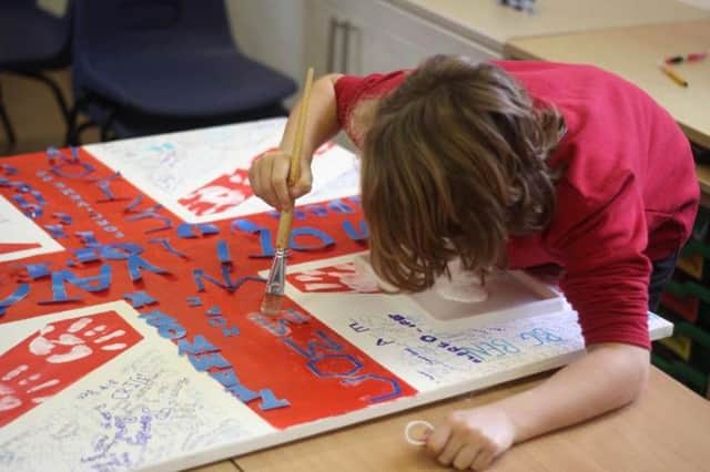 A pupil from Sarisbury Church of England Junior School gets creative for a good cause