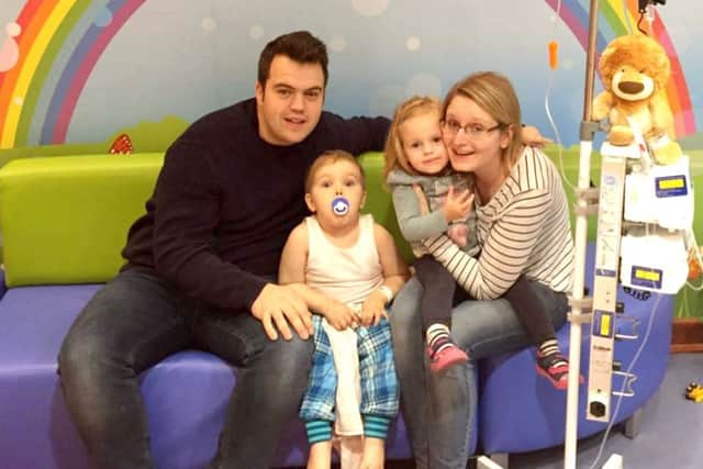 George O'Shaughnessy with his family - dad Craig, sister Isabella and mum Amy