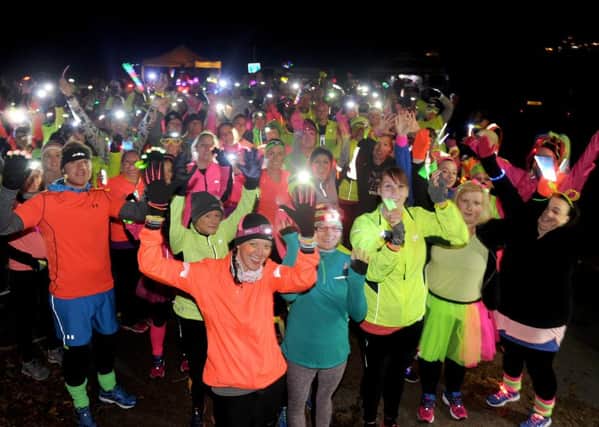 The Glow Around The Castle 5k run took place around Portchester Castle to raise money for a defibrillator for Fareham Parkrun.

Picture: Sarah Standing (161607-4340)