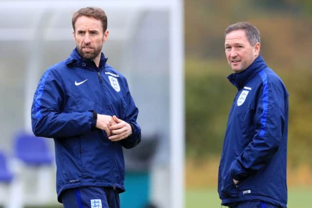 England assistant boss Steve Holland, right, was Gareth Evans youth-team coach at Crewe and chose not to offer him a professional contract
