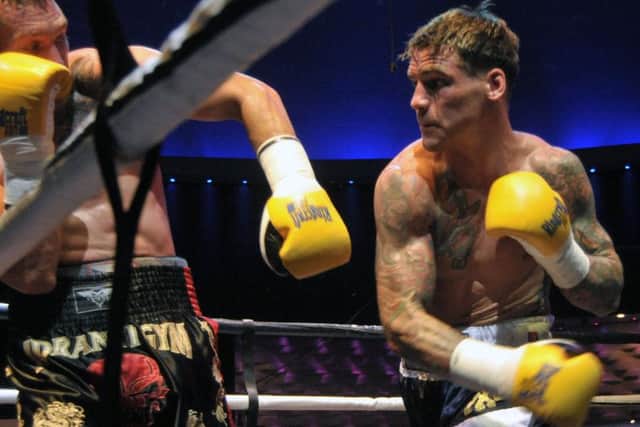 Joel McIntyre, right, beats Vladimir Idranyi. Pic Mick Young