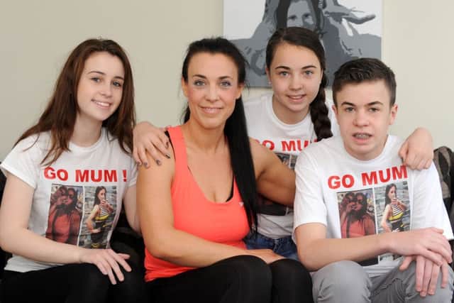 Emma Hine with her children, from left, Chloe, Jessica and Lewis