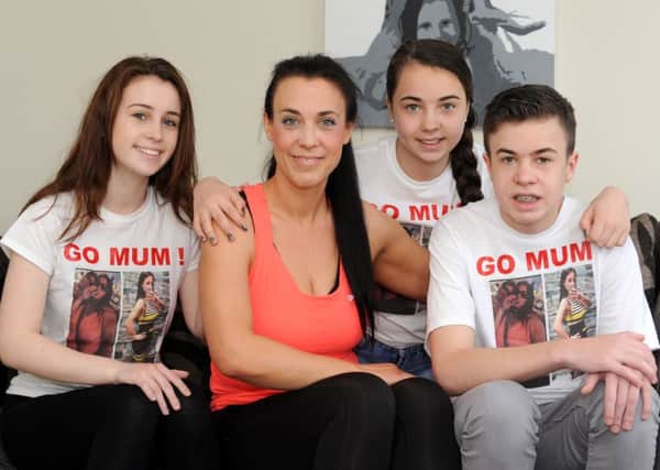 Emma Hine with her children, from left, Chloe, Jessica and Lewis