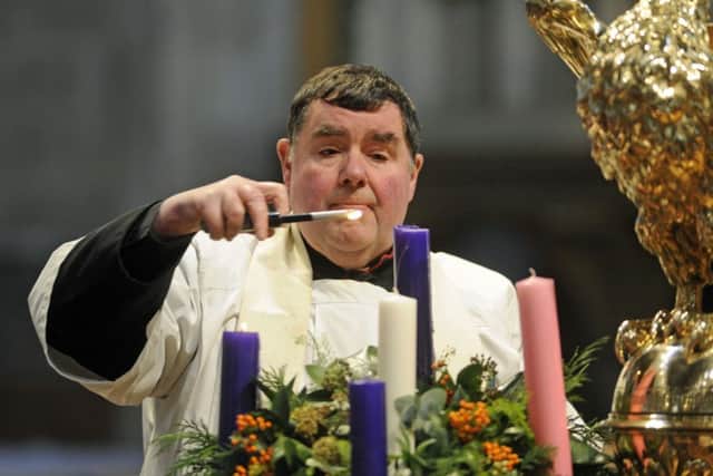 Canon Bob White at The News carol service