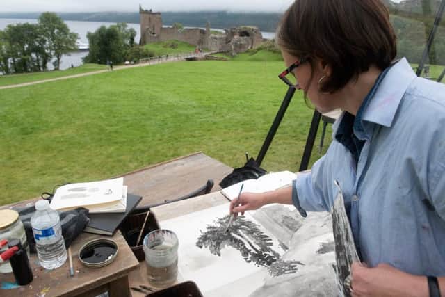 Artist Kim Whitby at work on a landscape on the Sky Arts show