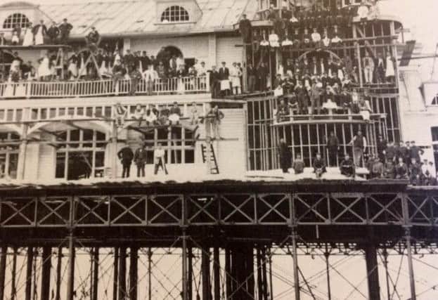 Workers all over South Parade Pier, Southsea