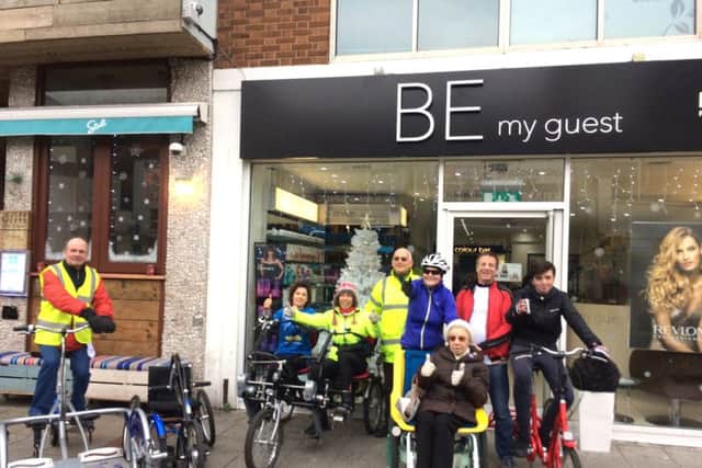 Generous Ines, second left, with volunteers and participants from Wheels for All