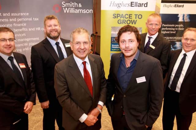 Keynote speakers Gerald Ratner and Andy Lennox, front centre, flanked by, from left, Smith & Williamsons Southampton office managing partner Andrew Edmonds, Trethowans senior partner Simon Rhodes, Hughes Ellard managing director Gary Jeffries and Santander's corporate and commercial bank south east and Solent regional director Gwyn Price