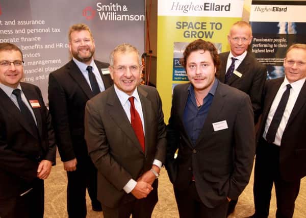 Keynote speakers Gerald Ratner and Andy Lennox, front centre, flanked by, from left, Smith & Williamsons Southampton office managing partner Andrew Edmonds, Trethowans senior partner Simon Rhodes, Hughes Ellard managing director Gary Jeffries and Santander's corporate and commercial bank south east and Solent regional director Gwyn Price