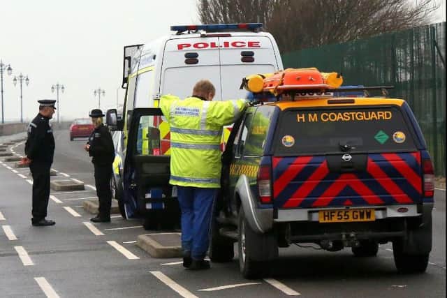 Police and coastguard at Eastney Esplanade after mens clothing was found at 9.40am on December 6. Picture: UK News in Pictures