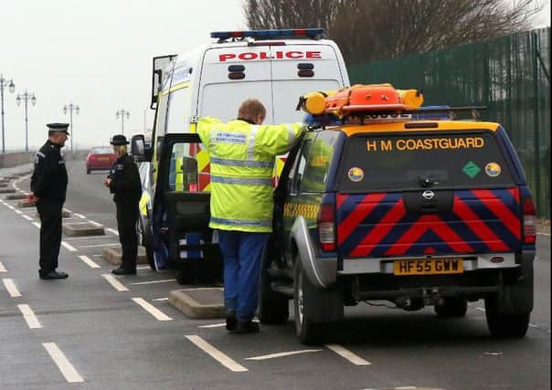 Police and coastguard at Eastney Esplanade after mens clothing was found at 9.40am on December 6. Picture: UK News in Pictures