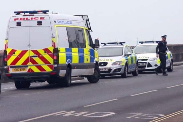 Police and coastguard at Eastney Esplanade after mens clothing was found at 9.40am on December 6. Picture: UK News in Pictures