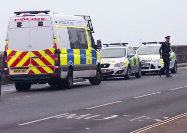 Police and coastguard at Eastney Esplanade after mens clothing was found at 9.40am on December 6. Picture: UK News in Pictures