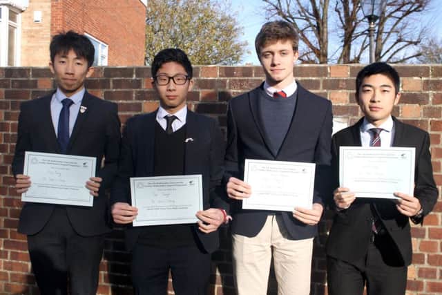Maths wizards Alex Feng, Yuki Yamada, Angus McIntosh and Leonel Liang, left, St Johns College