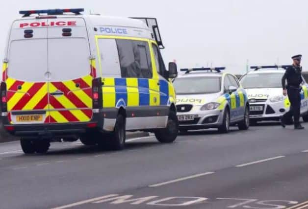 Police and coastguard at Eastney Esplanade after mens clothing was found at 9.40am on December 6. Picture: UK News in Pictures
