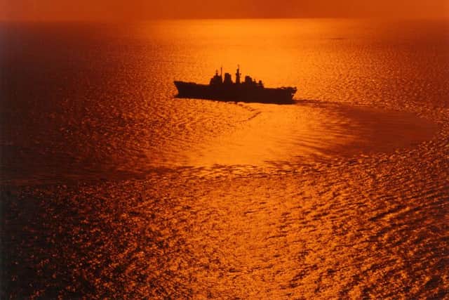 INTO THE SUNSET HMS Illustrious leaves the Med for the Adriatic for her last deployment there in the winter of 1995