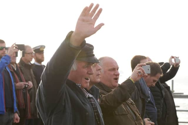 Crowds gather to see HMS Illustrious leaving Portsmouth Picture: Sarah Standing (161622-4628)