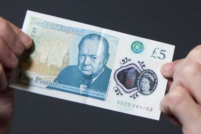 A new five pound note.