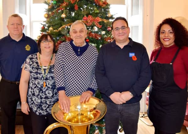 Left to right - Colour Sergeant Andrew Laishley, care home manager Viv Coombs, Clive Pearce, Ashley Vingoe, Royal British Legion case officer for the Isle of Wight, Hampshire and Dorset, and carer Kerry Hall